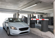 driver-uses-parking-control-and-parking-revenue-system-in-parking-garage