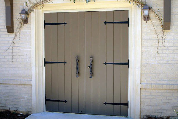 Entry Wood Doors with Custom Hardware.