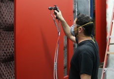 technician-painting-doors-in-full-service-professional-in-house-paint-booth