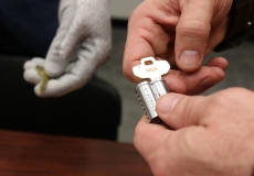 locksmith-pairs-newly-cut-key-with-new-core