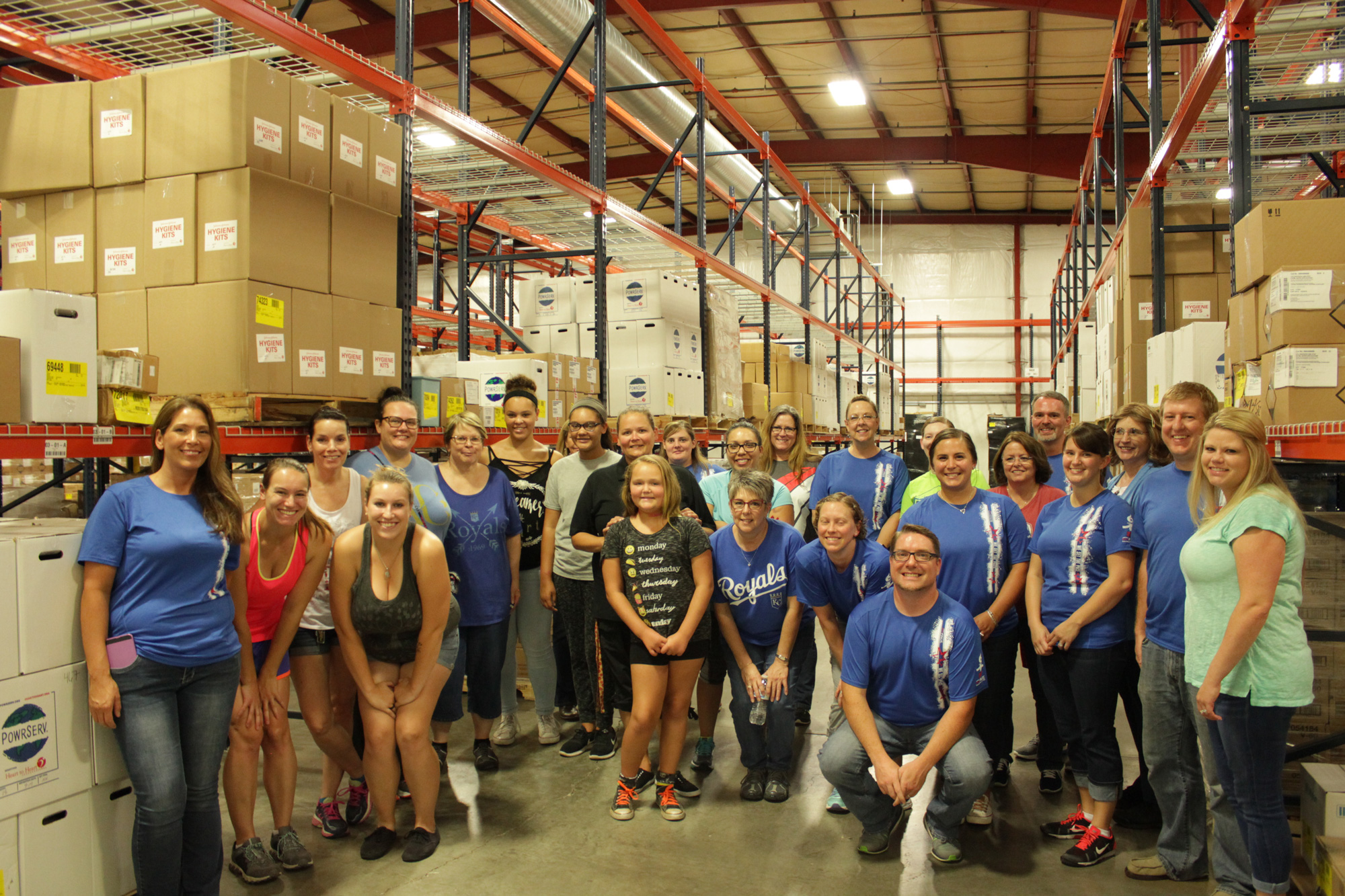 Group of employees volunteer at local charity
